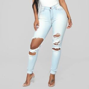 need gone !! never worn . light blue acid washed beach bum fashion nova jeans
